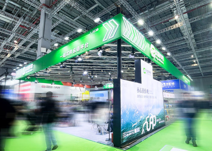 What are the steps in the exhibition booth construction process?